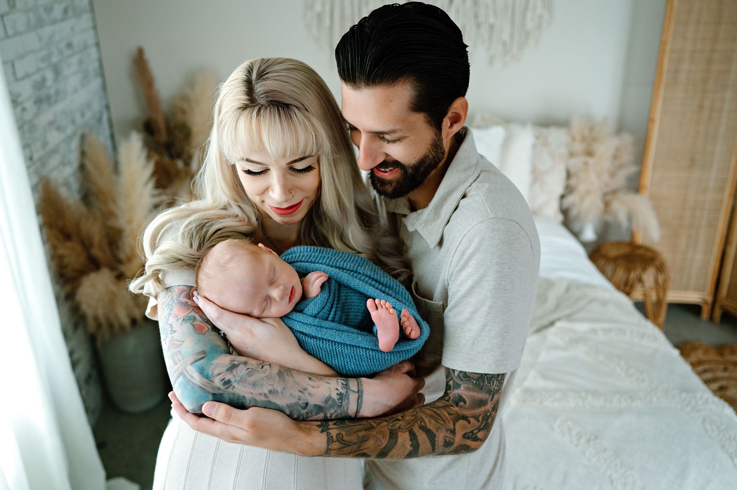A collection of four tender family moments featuring a sleeping baby and parents in soft, natural lighting.