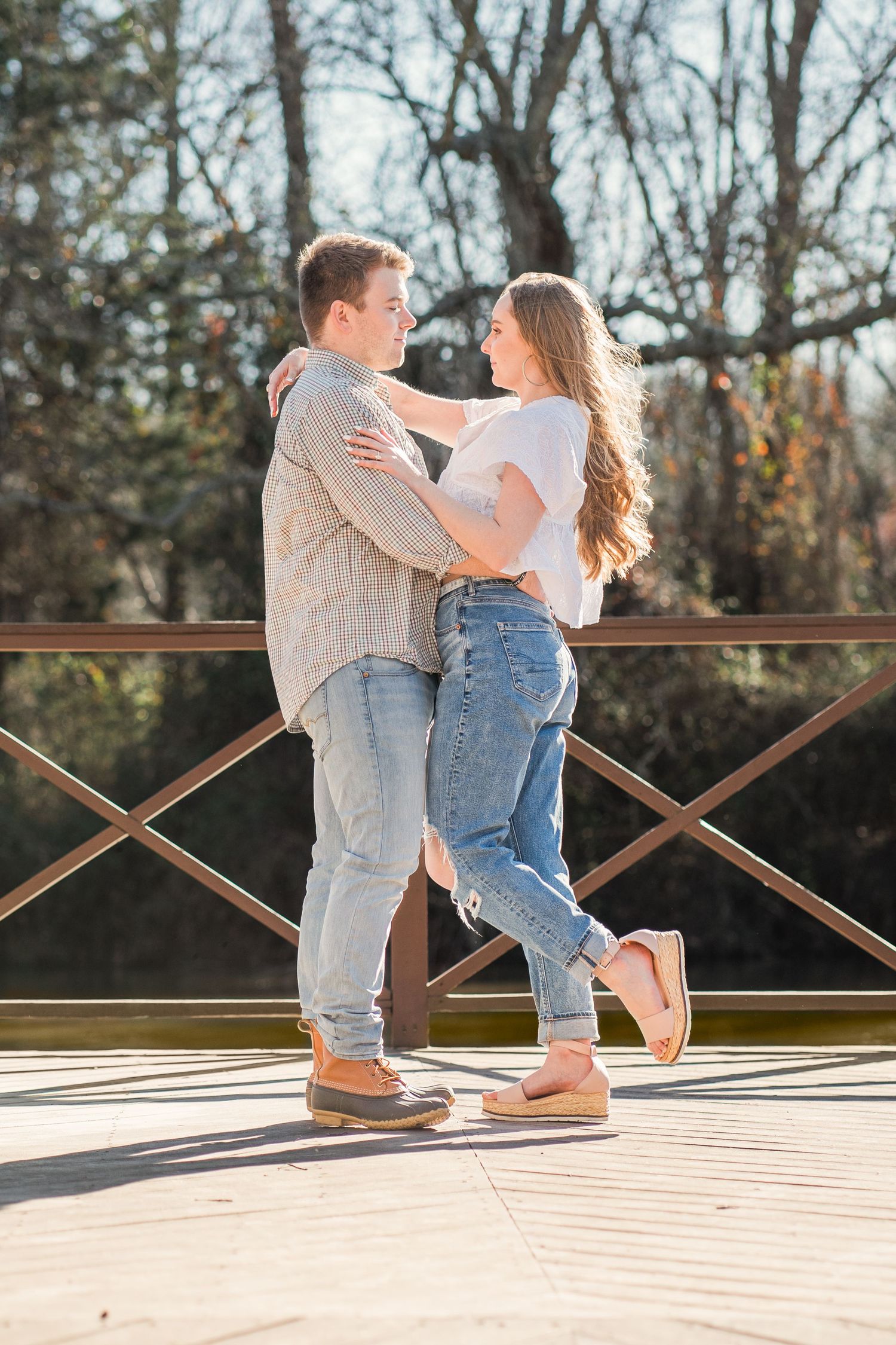 Couple dancing on a deck overlooking the Saluda River