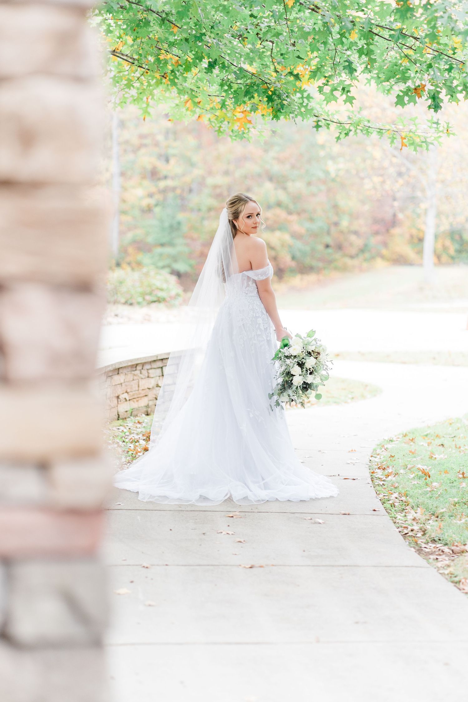 bride walking on sidewalk of camp spearhead