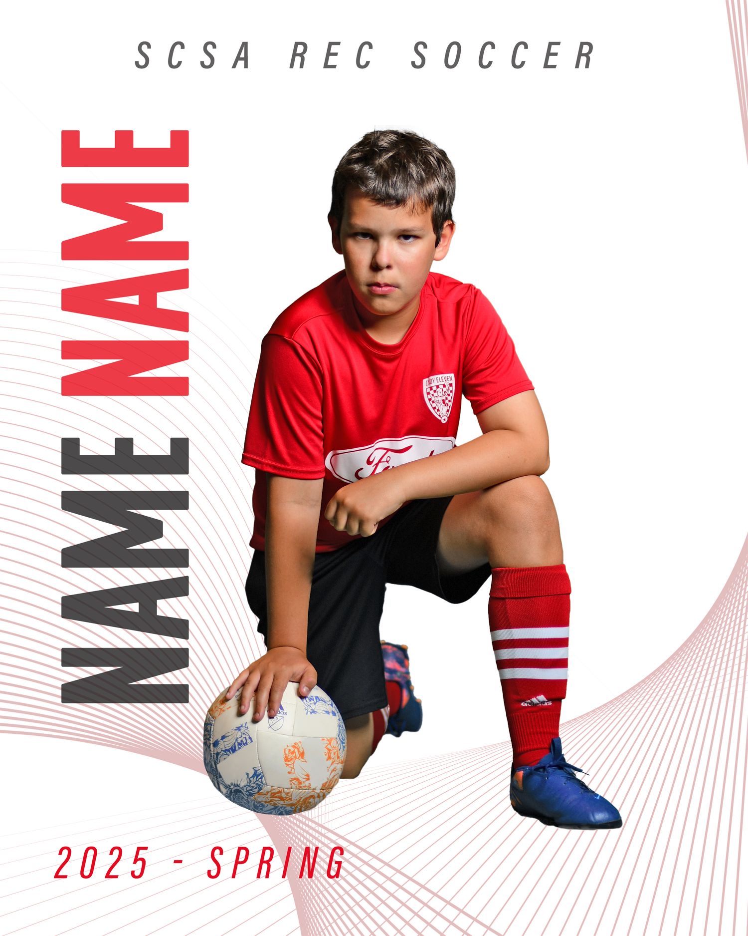 Soccer player posing with ball