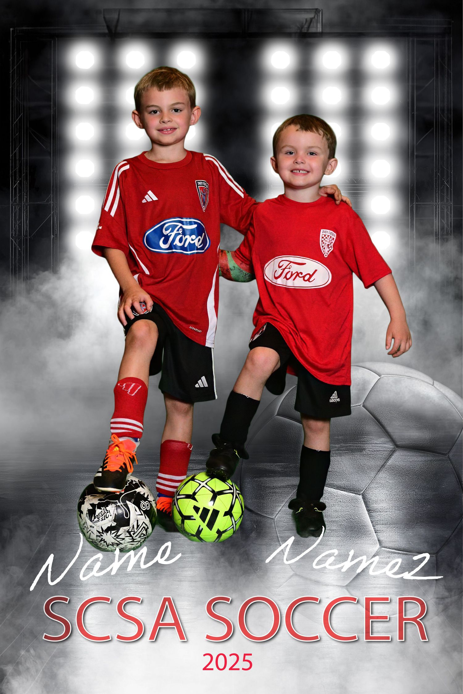 Boys embracing with soccer balls for photo