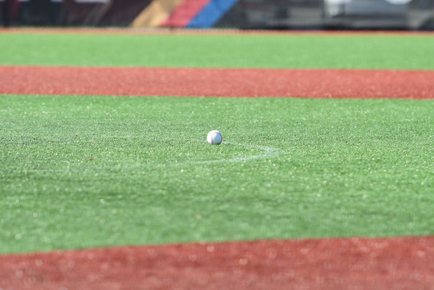 Baseball sitting on a field