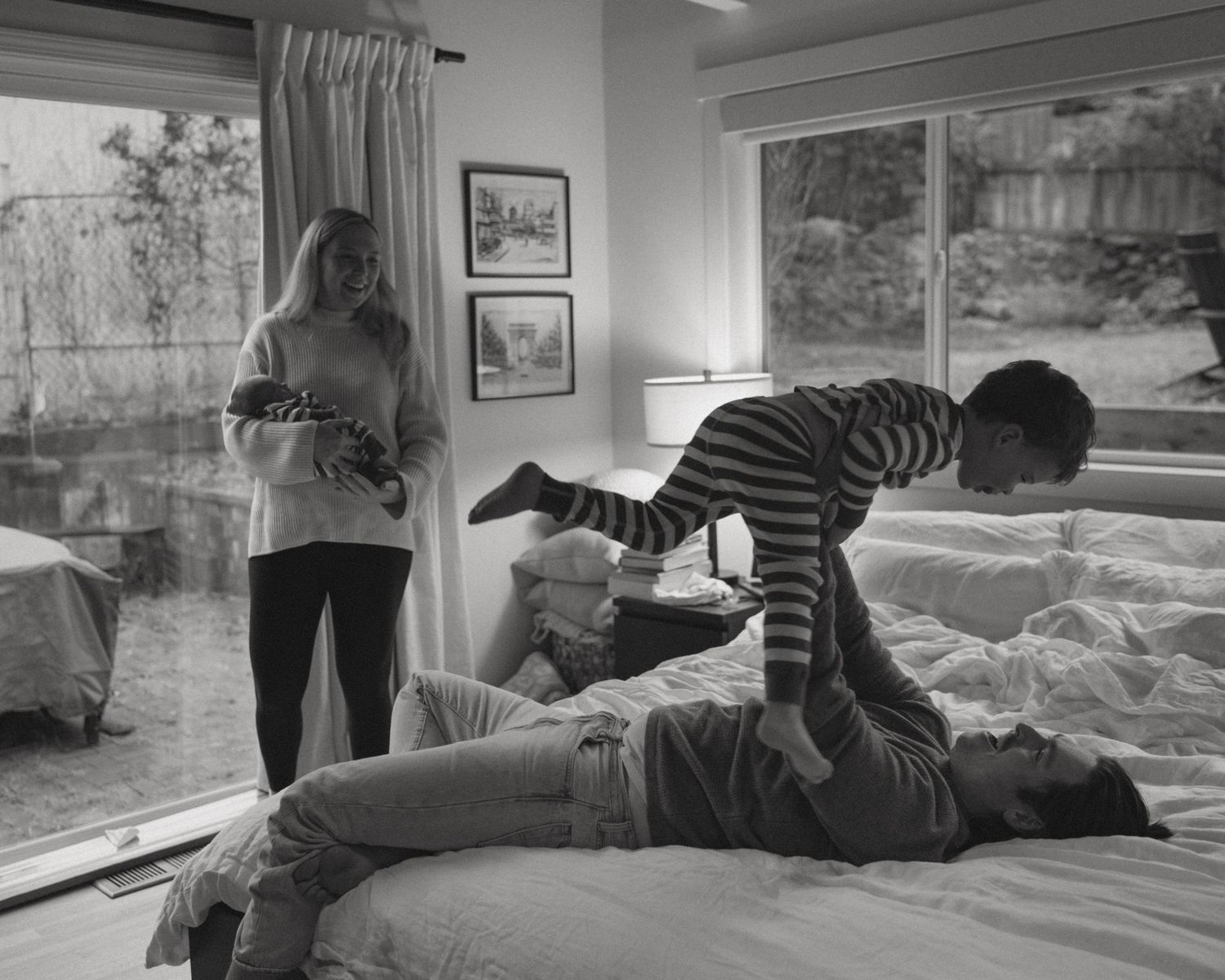 Black and white photo series showing relaxed moments on a comfortable couch.