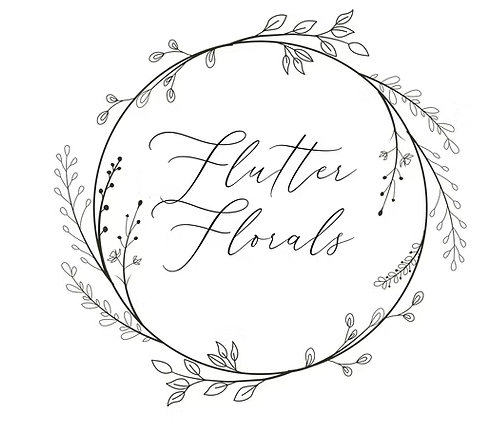 A delicate hand-lettered logo design for 'Flutter Florals' with botanical wreath and cursive calligraphy.