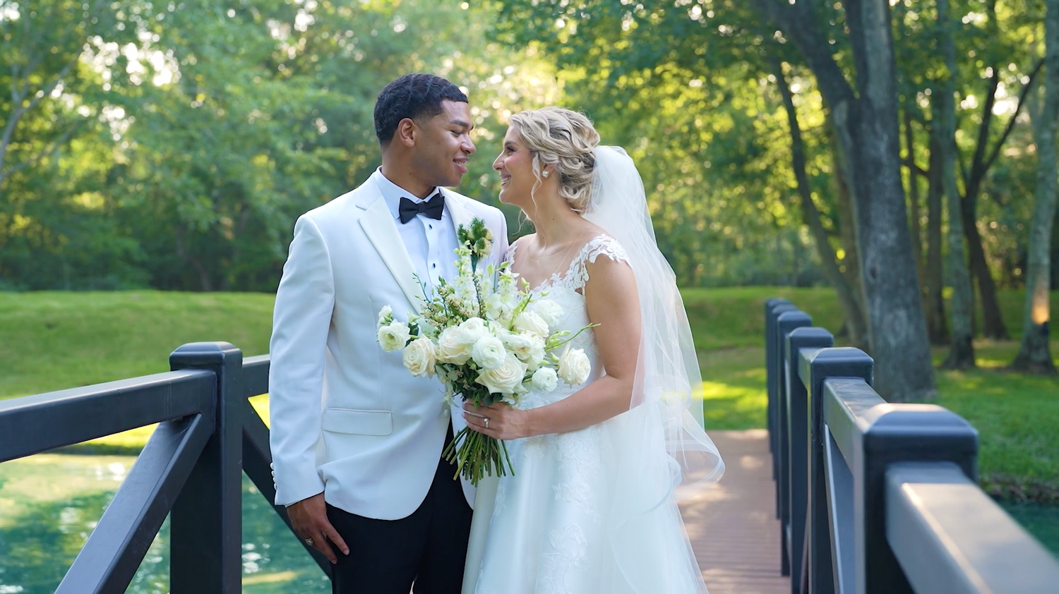 A romantic outdoor wedding photo series with lush greenery and sunlit backdrops.