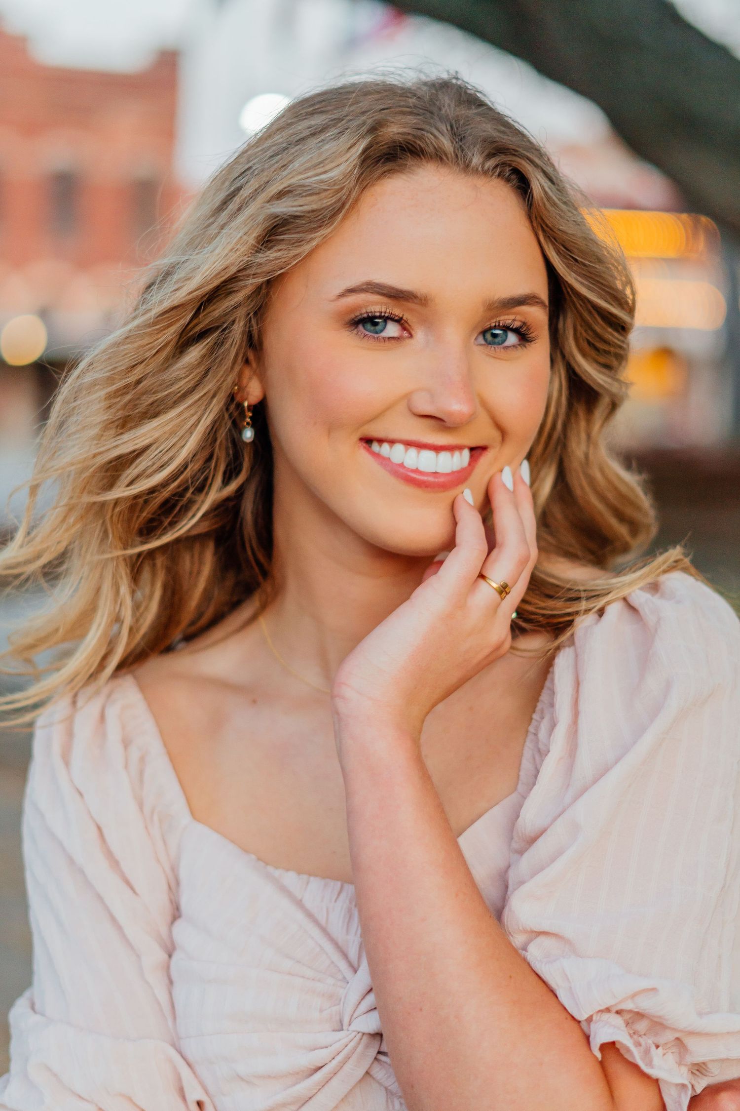 Close up beauty portrait featuring natural makeup and soft lighting.