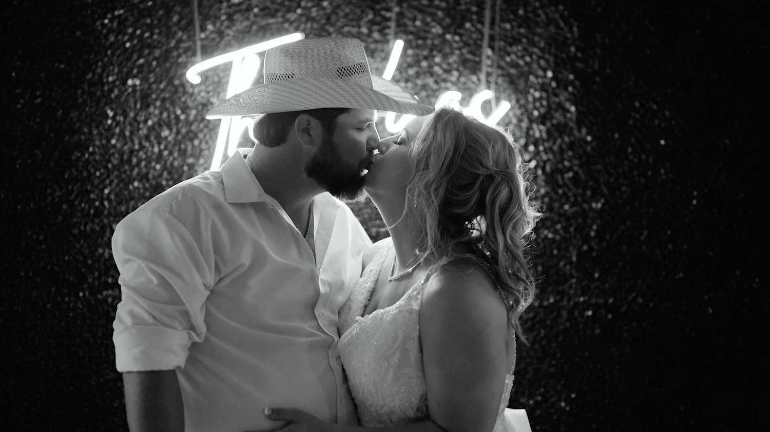 Artistic black and white series of romantic wedding moments at night.