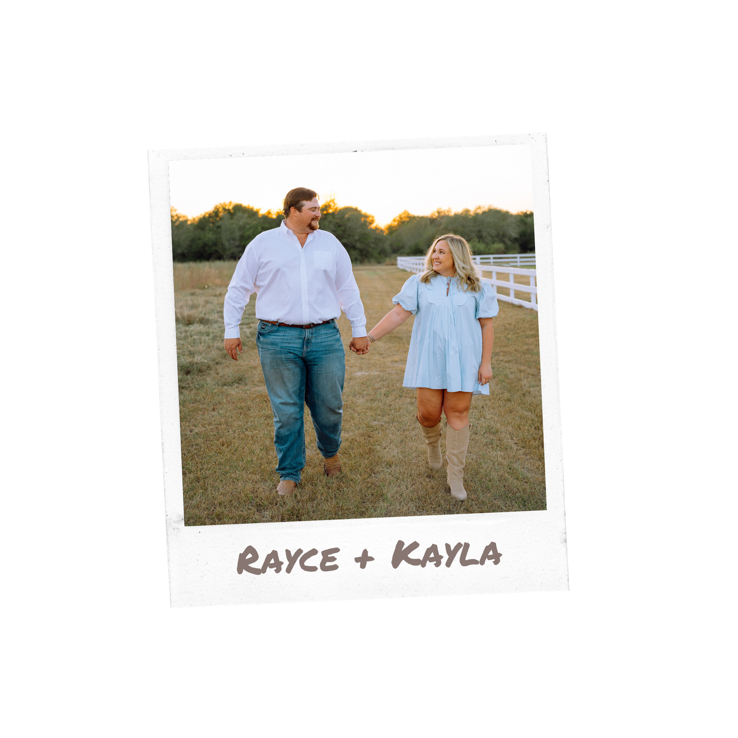 Couple walking hand in hand through a field at sunset.