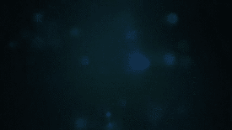 A dark abstract background with blurred blue and black tones creating a moody atmospheric effect.