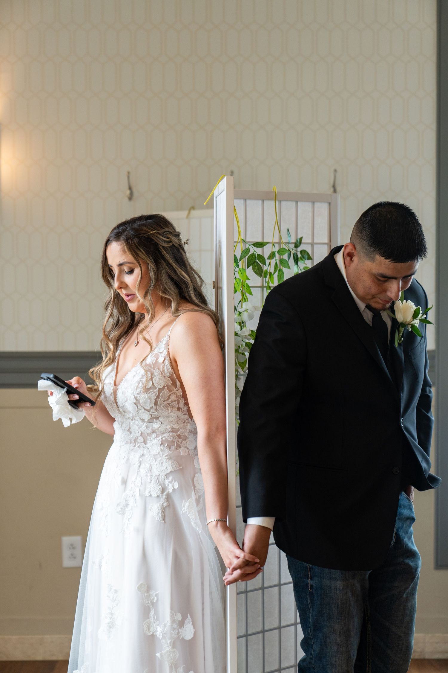 A couple shares an intimate first look moment before their wedding ceremony.