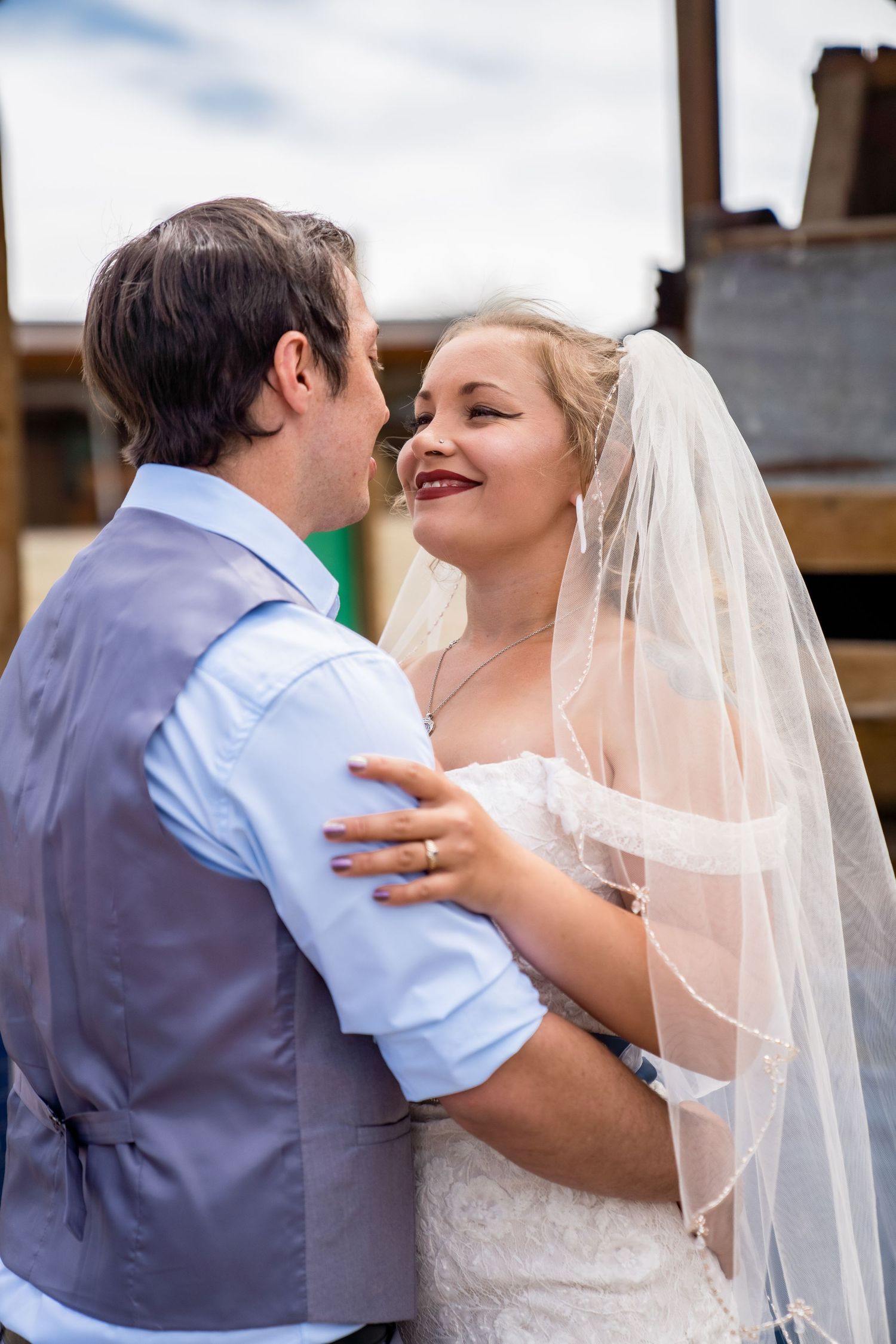 A romantic first look sequence captures a couple sharing intimate moments in their wedding attire.