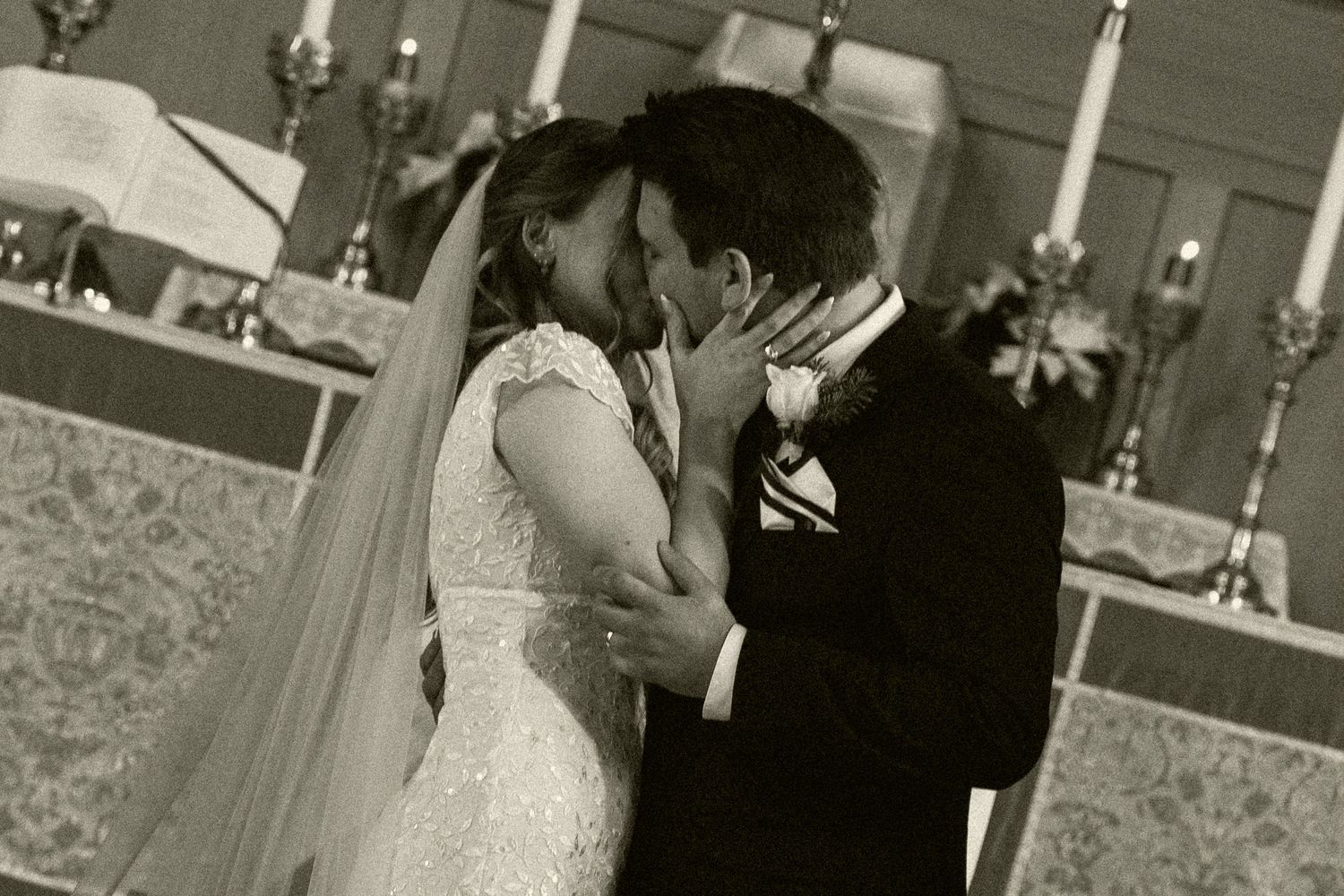 A wedding couple dances together during their first dance at an elegant reception venue.