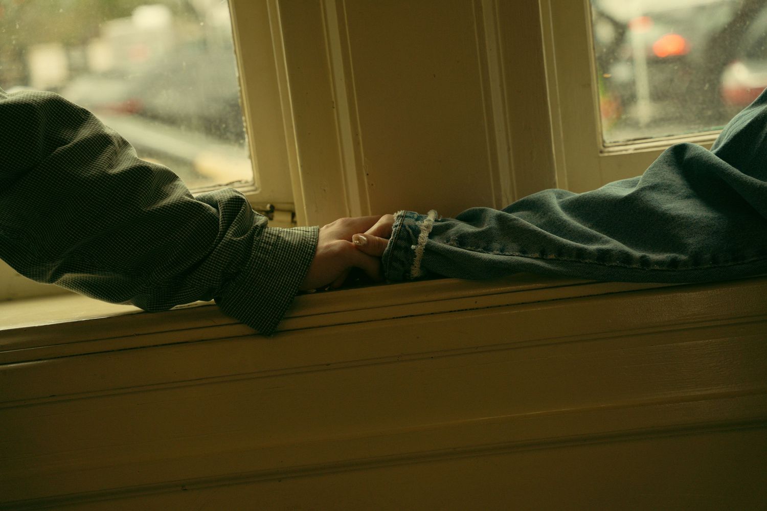 Warm-toned interior shots showing window light and architectural details.