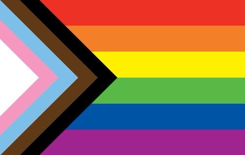 Progress Pride flag featuring rainbow stripes with additional chevron of trans and POC-inclusive colors.