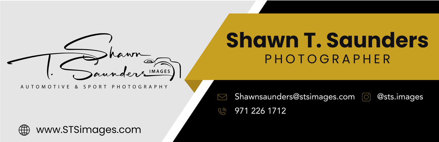 Professional photographer's business card design with diagonal stripe elements.
