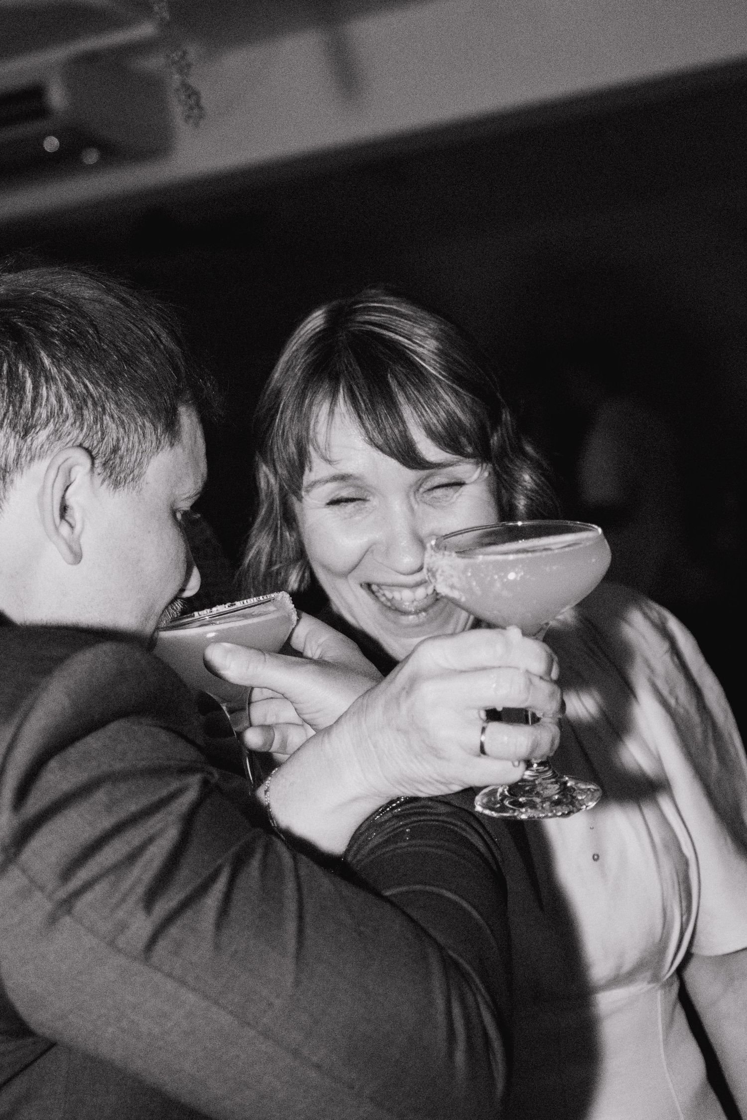 A sequence of black and white romantic photographs showing couples kissing in vintage style.
