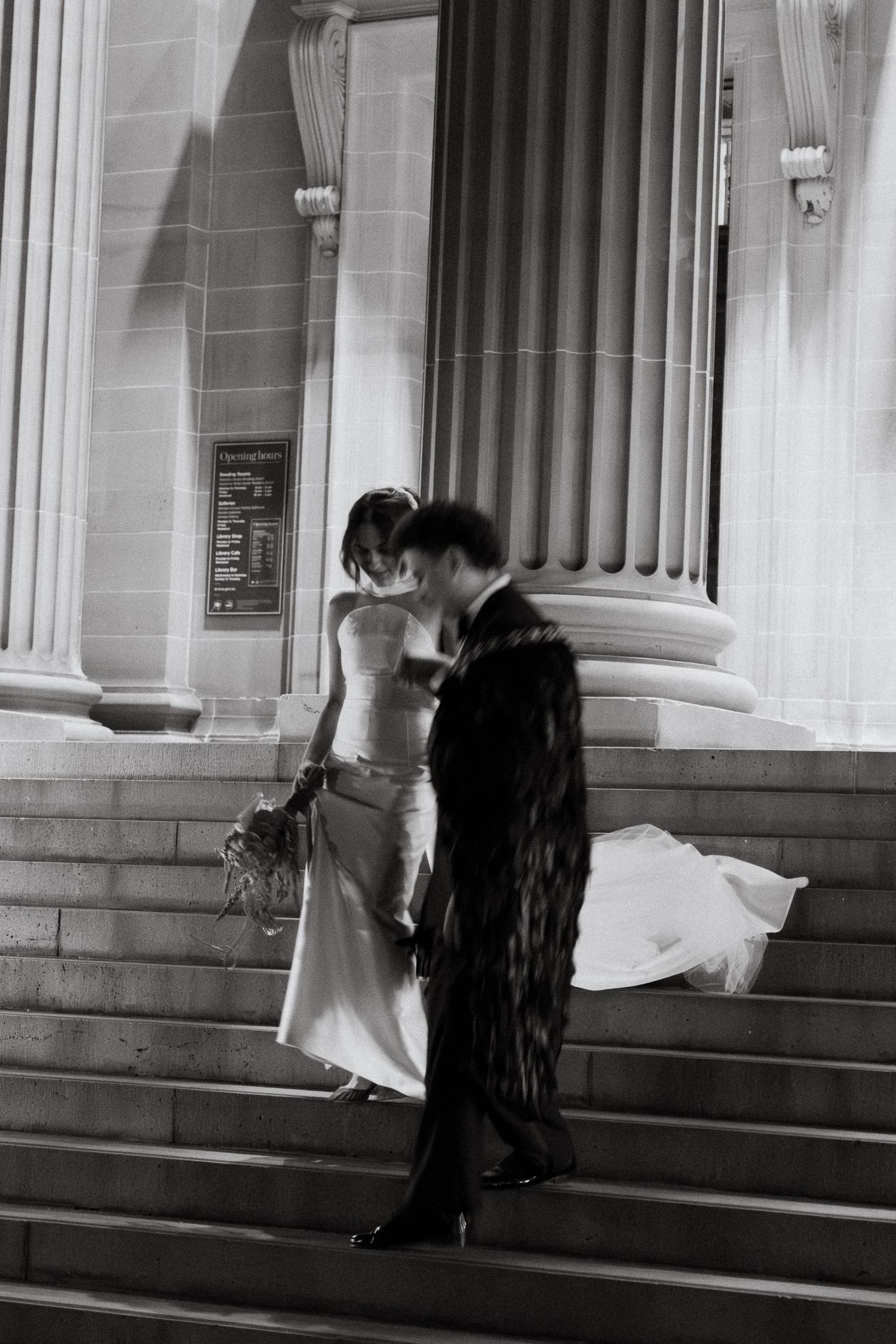 A black and white photo sequence shows two people interacting on stone steps outside a building with columns.