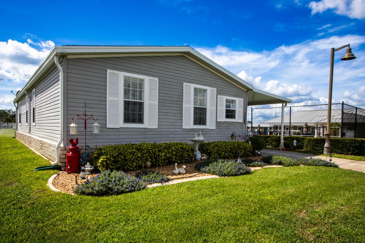 High dynamic range photo of the front exterior of a house in Frostproof, Florida