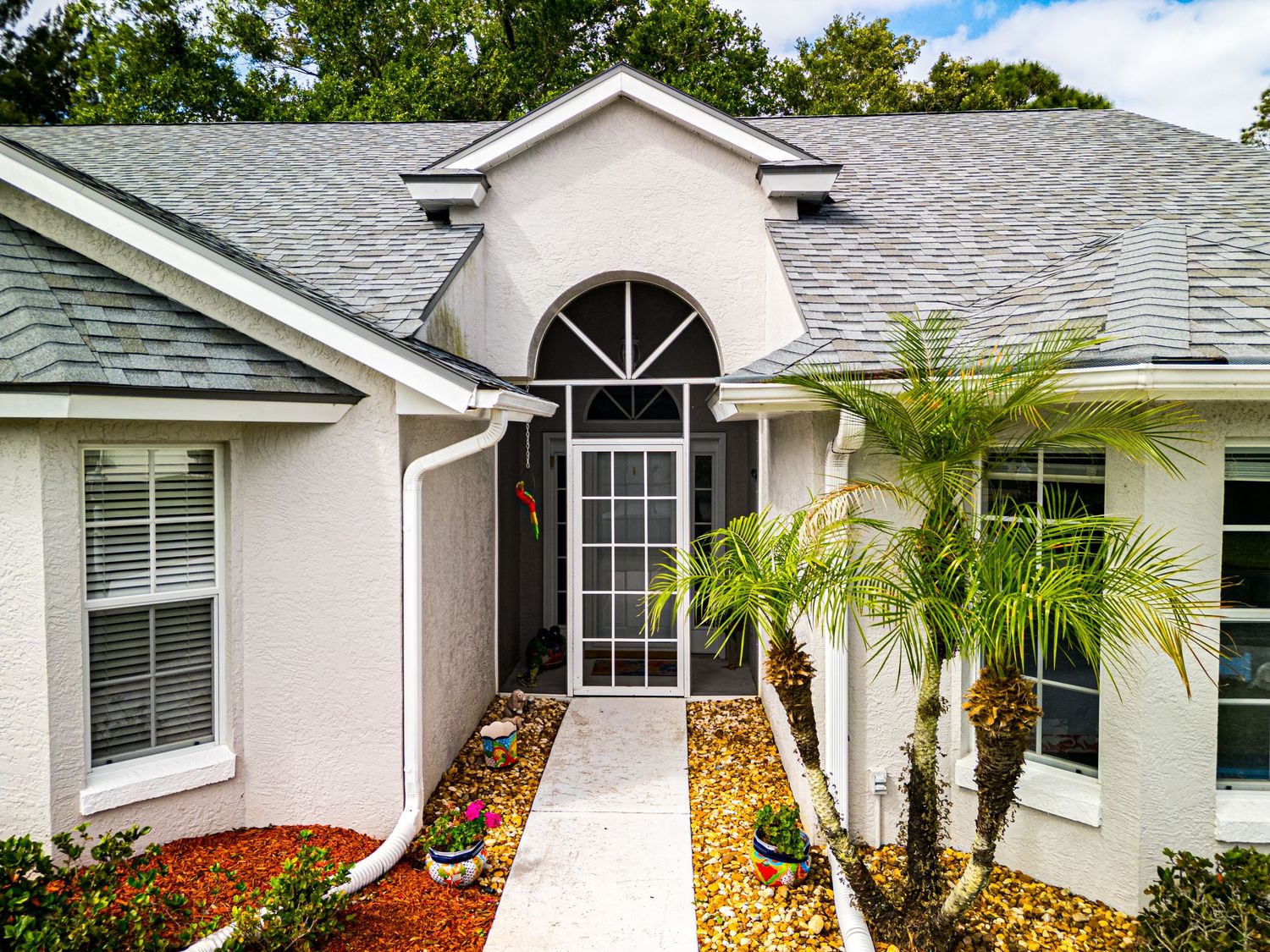 A picture of the front of a house that is for sale in Sebring, Florida