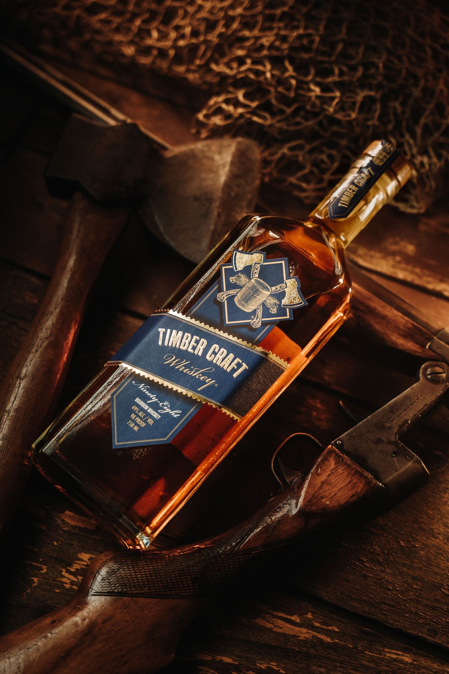 Timber Creek whiskey bottle displayed on dark rustic wooden surface with dramatic lighting and shadows.
