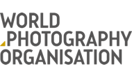 World Photography Organisation logo featuring bold black text on white background with a distinctive yellow square accent mark.