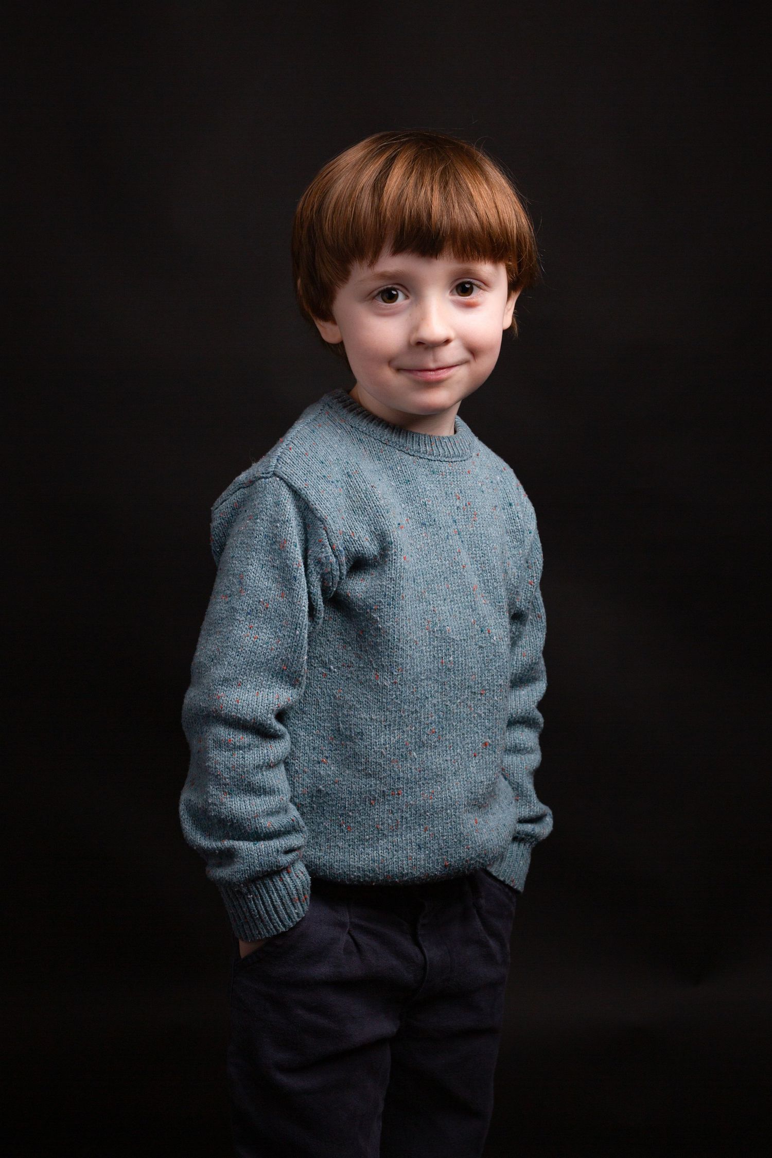 picture of a boy in the studio posing for a photograph