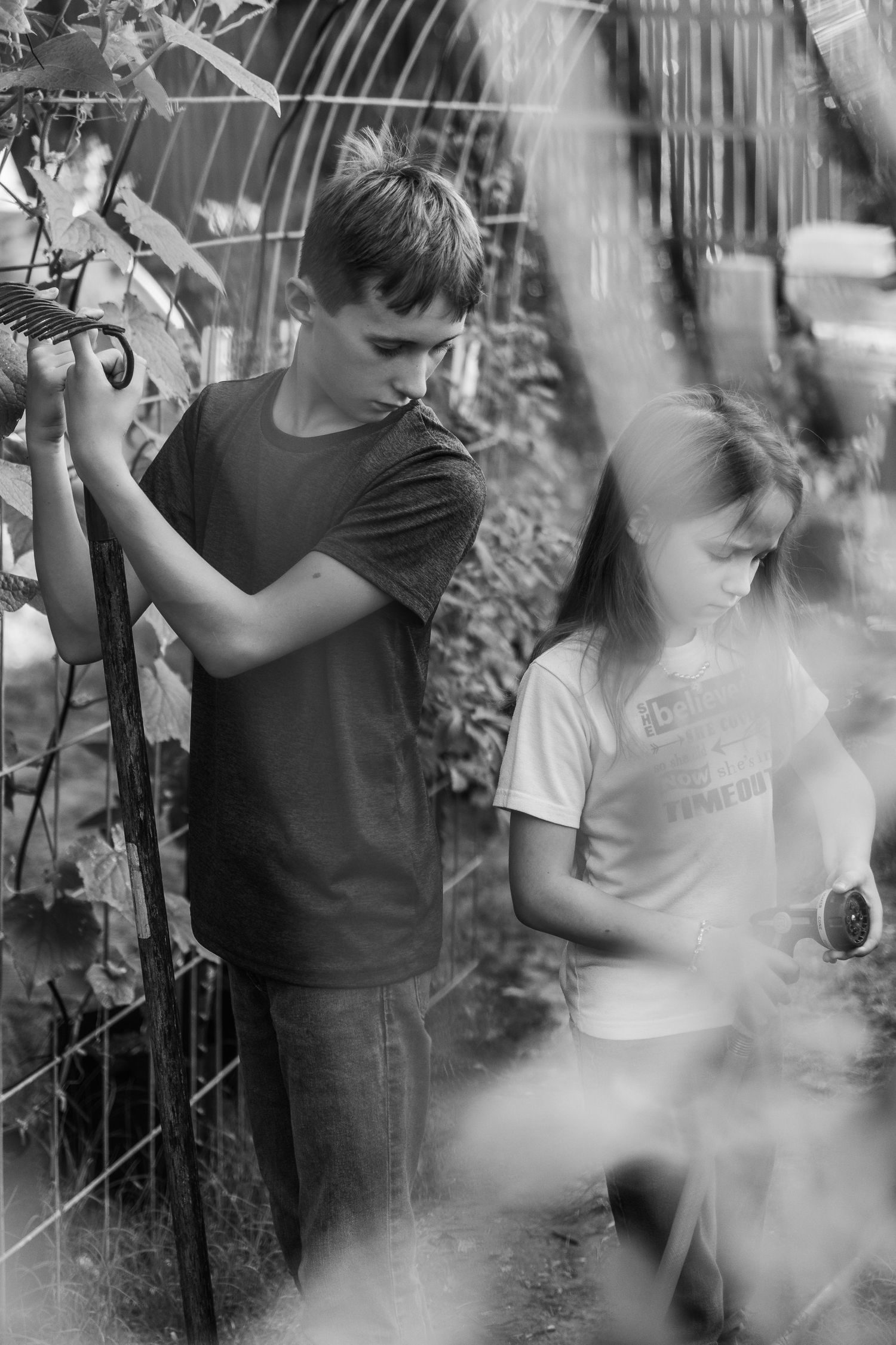 black and white images of children working in a garden