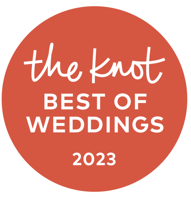 The Knot Best of Weddings 2023 award badge on a coral red circle with white text.