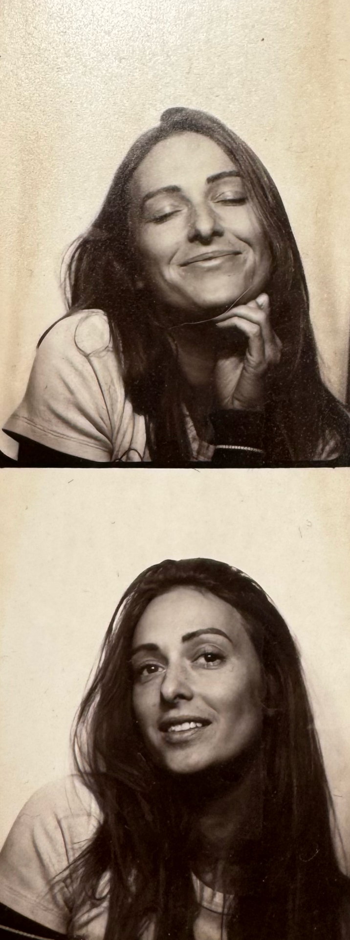 Vintage-style photo booth strip showing woman with long dark hair smiling with eyes closed and open.