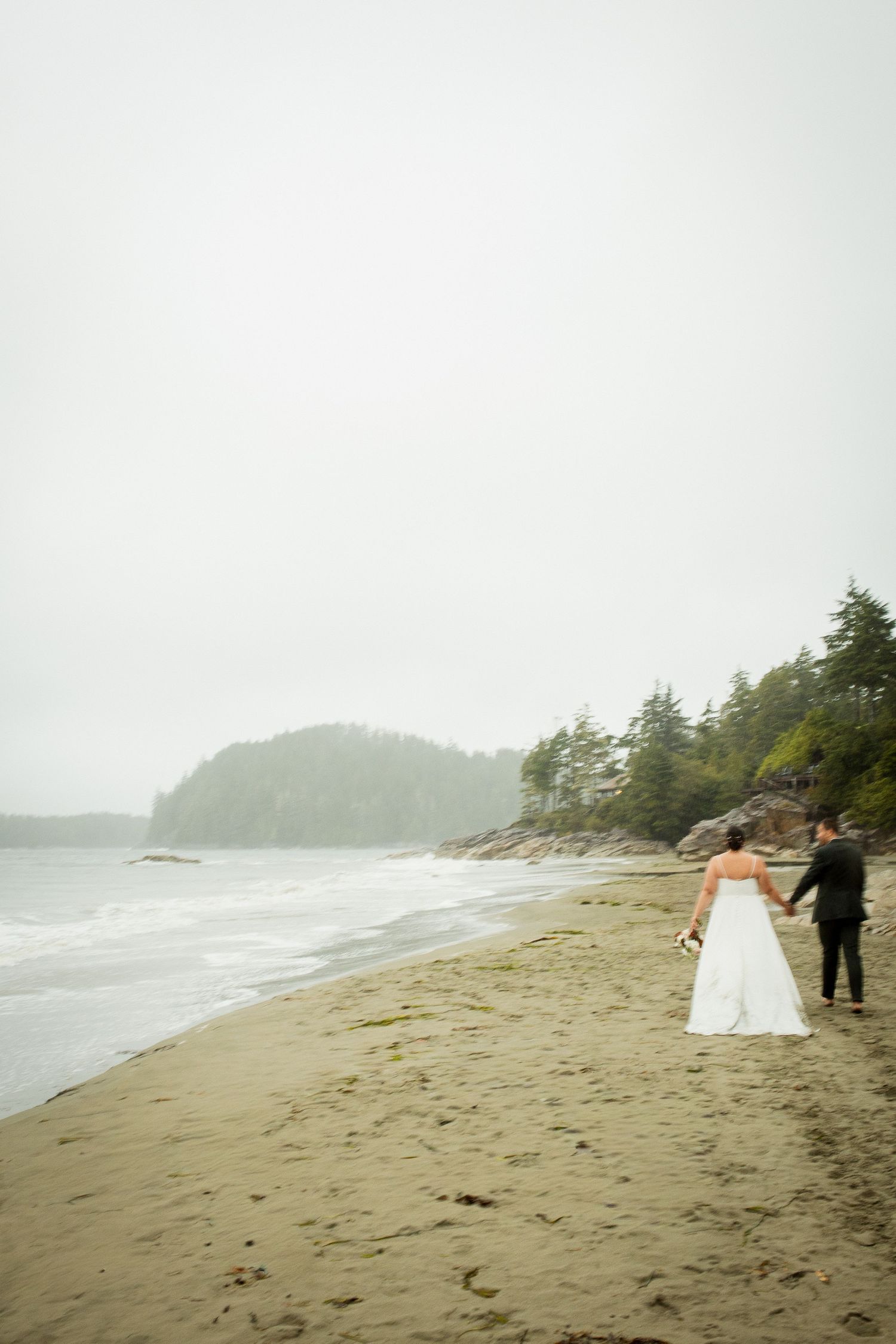 Tofino Elopement Photography Walking on the beach