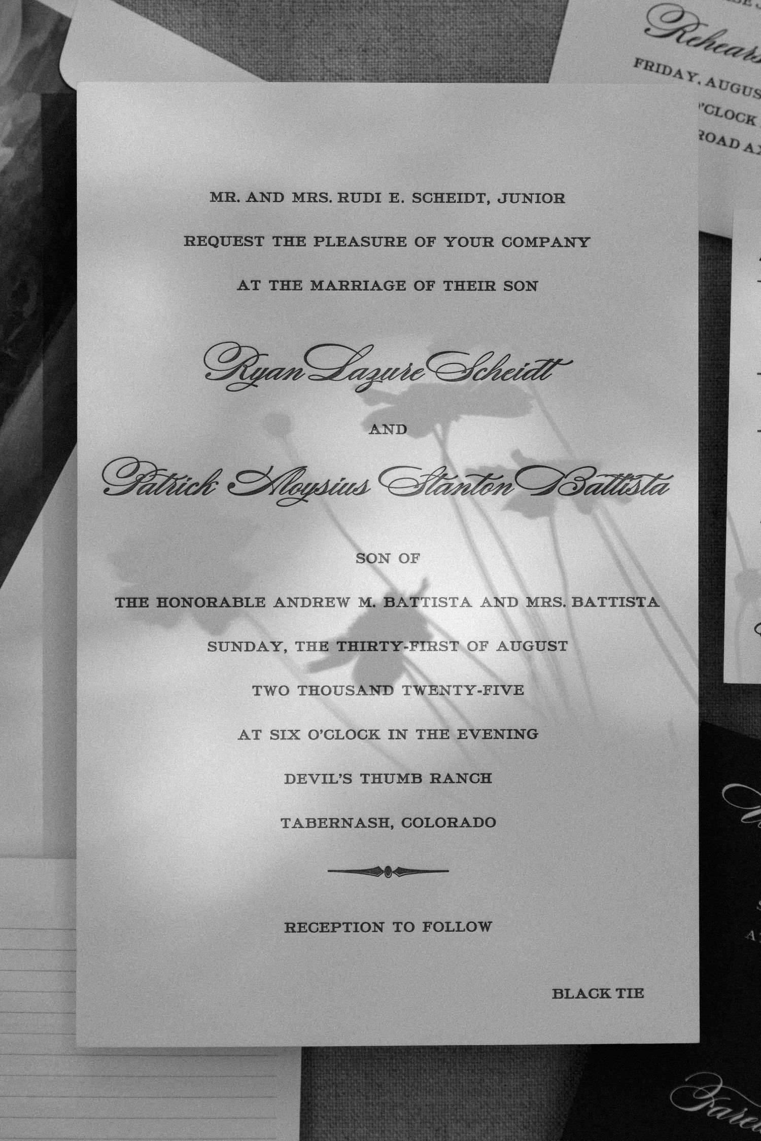 Elegant wedding invitation with formal text and classic typography on white paper.