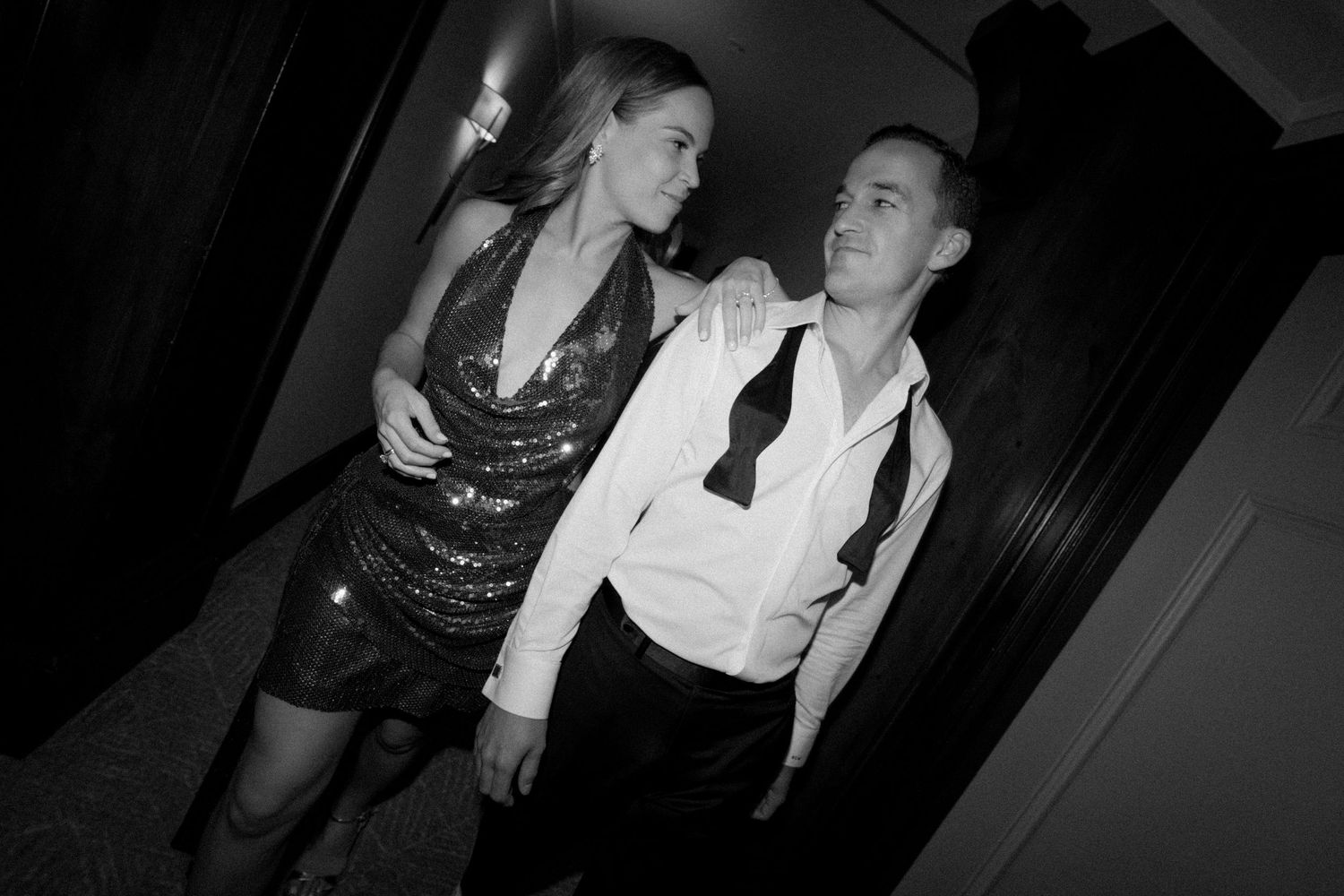 Black and white dance floor photos showing couples dancing at a wedding reception.