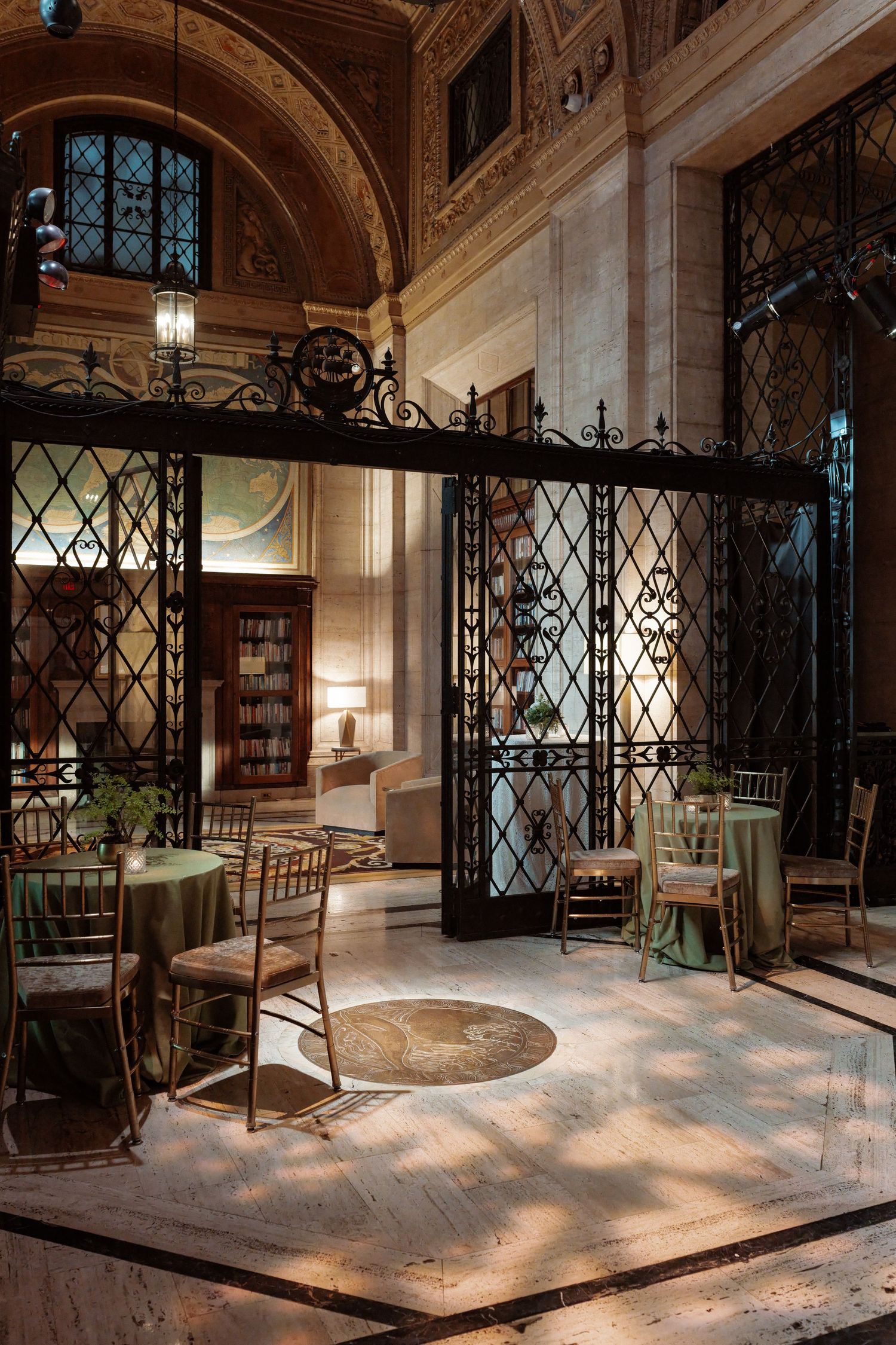 A grand, ornate interior with intricate architectural details and decorations.