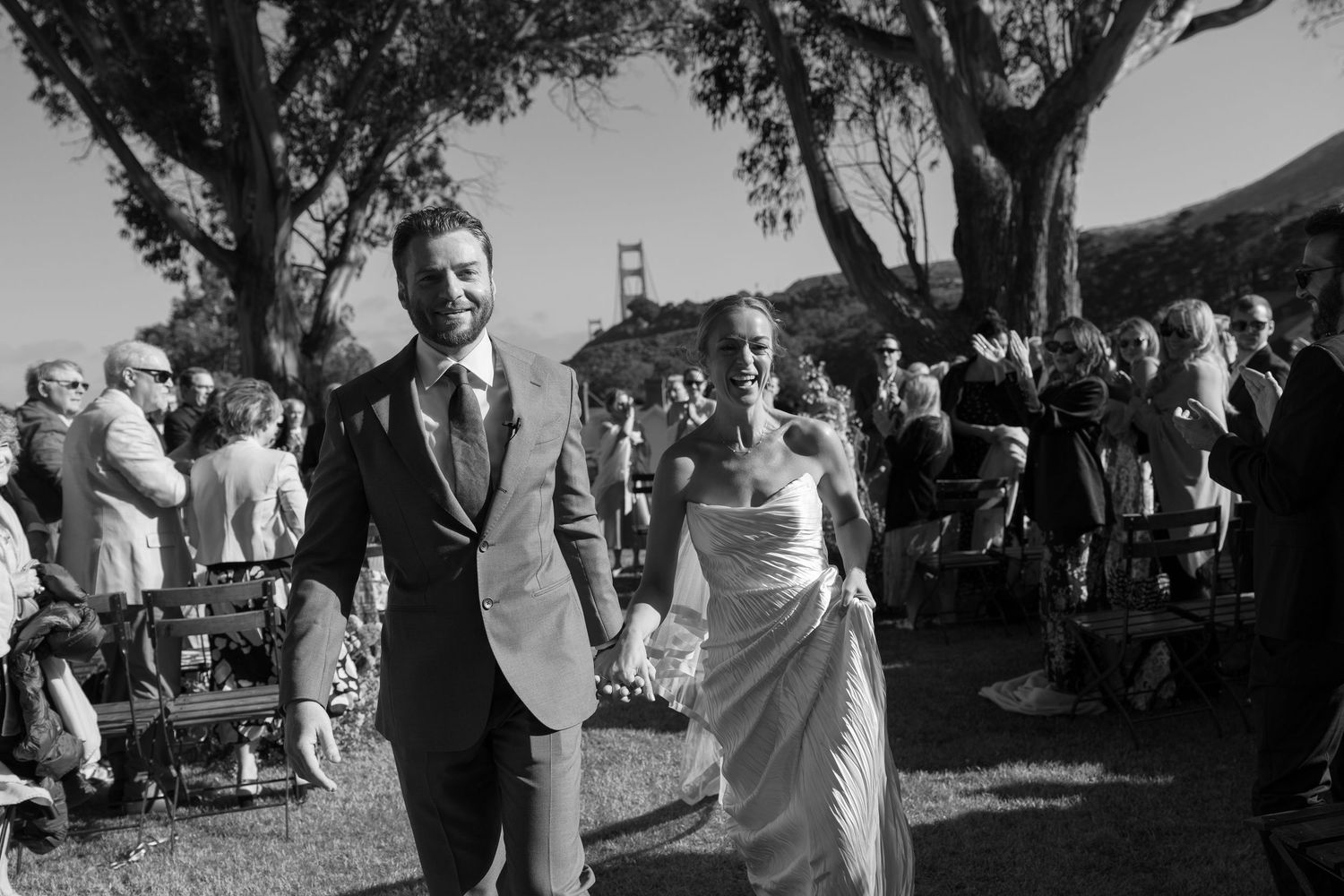 Black and white wedding ceremony photos in outdoor setting. Wedding at Cavallo Point in San Francisco. Golden Gate Bridge Wedding.