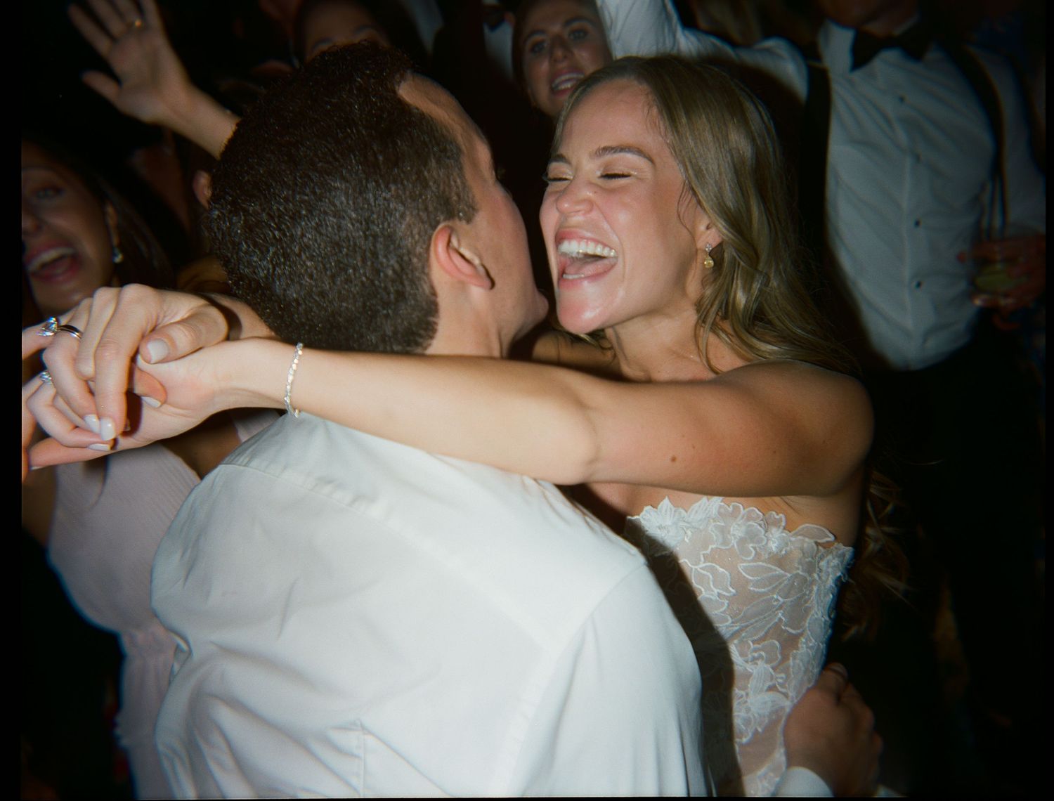 Intimate dance moments captured during wedding reception celebrations.