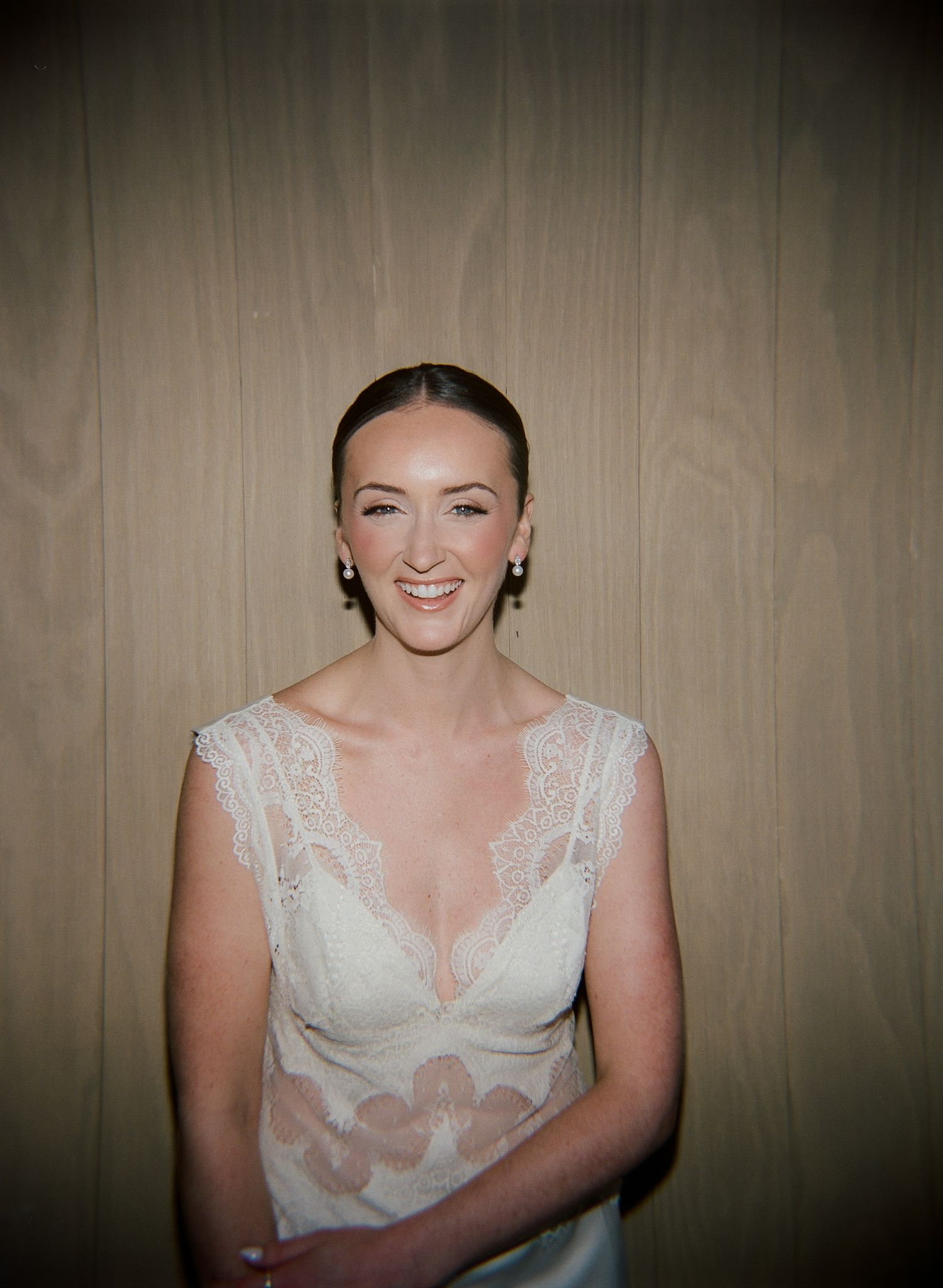 Artistic sequence showing a bride in a detailed lace wedding gown.