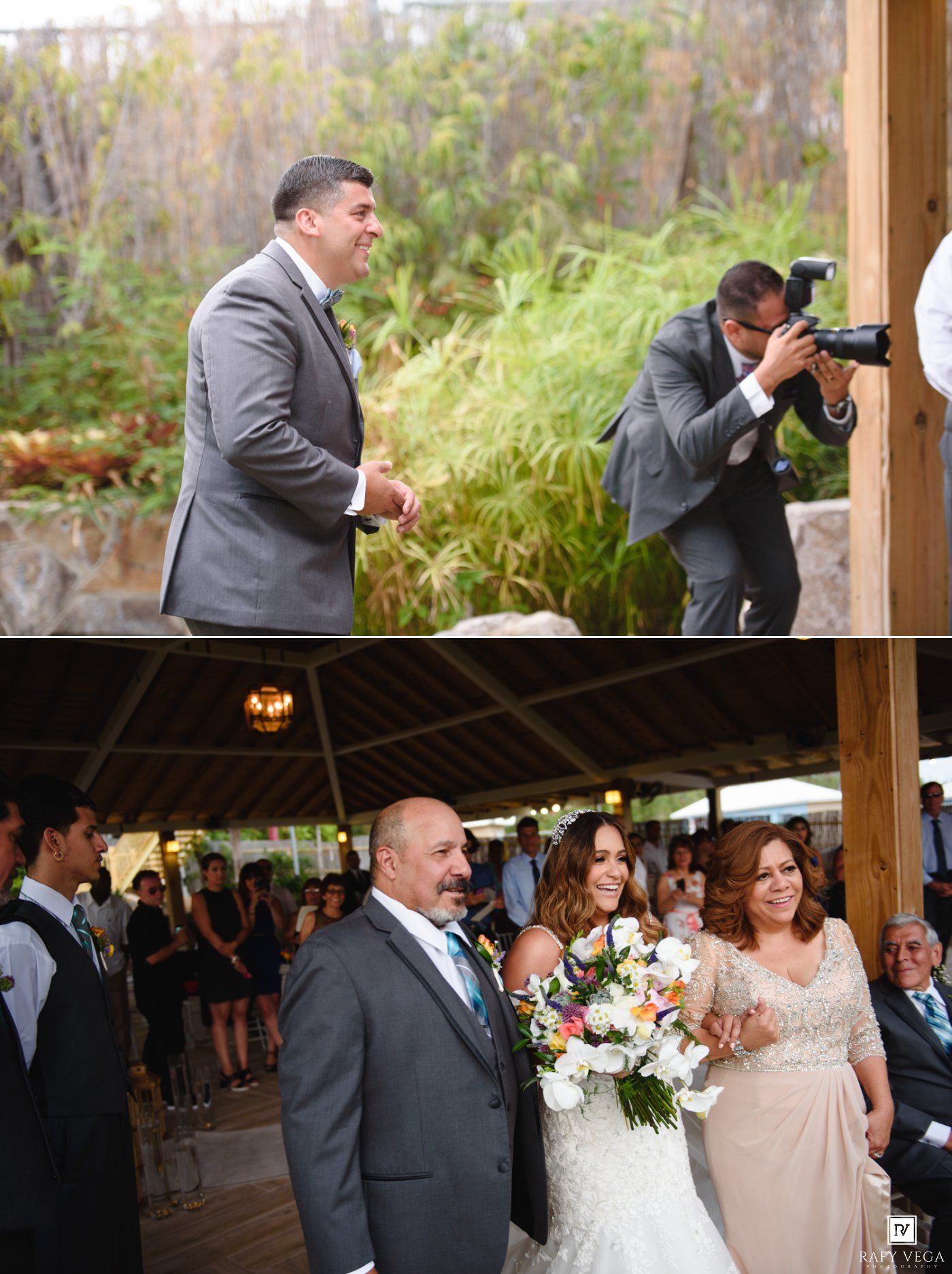 Groom smiles as bride walks down the aisle with her parents at an outdoor wedding ceremony.