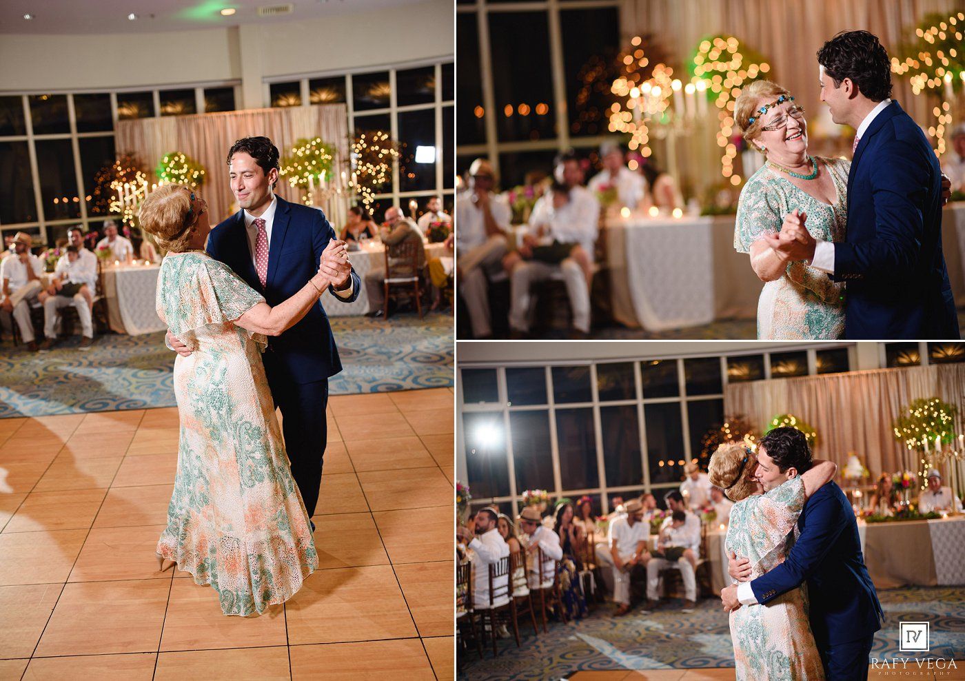 Couple shares romantic first dance at elegant wedding reception with guests seated at decorated tables in background.