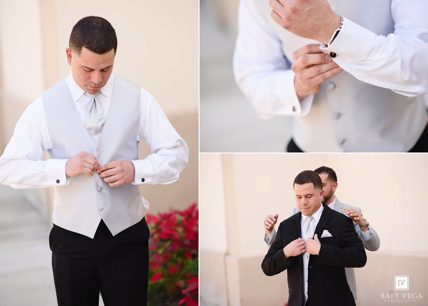 Groom in white vest adjusting suit details with groomsman helping tie necktie at wedding preparation.