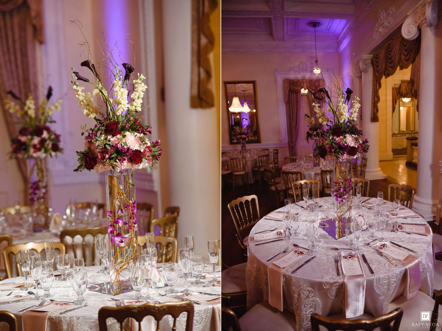 Elegant wedding reception tables with tall floral centerpieces featuring purple orchids and white blooms in a grand ballroom.