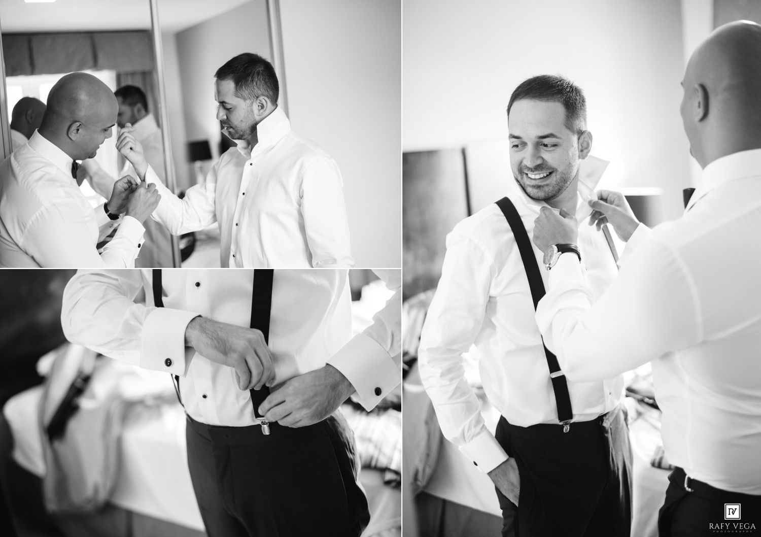 Black and white photo of two men in white shirts and suspenders helping each other get dressed for a wedding.