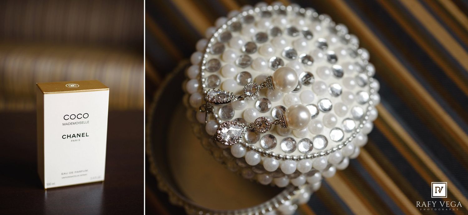 Chanel Coco perfume bottle beside a decorative pearl and crystal jewelry box on a wooden surface.