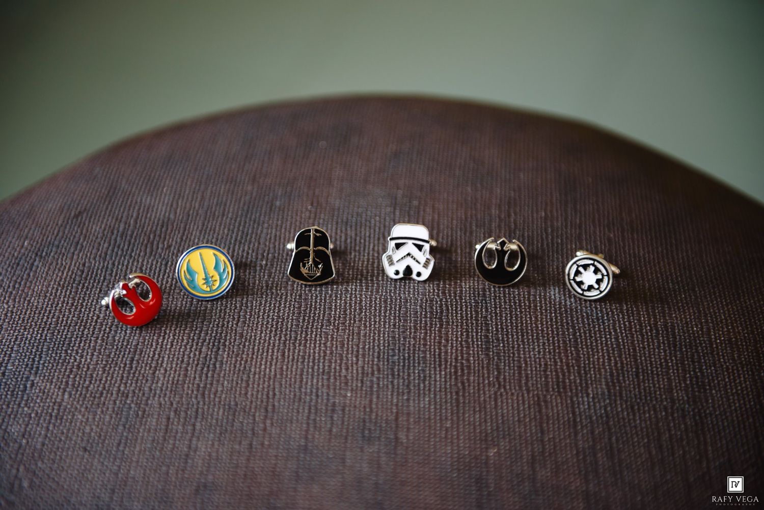 Star Wars themed cufflinks collection featuring Darth Vader, Stormtrooper, X-Wing and Rebel Alliance designs on fabric.