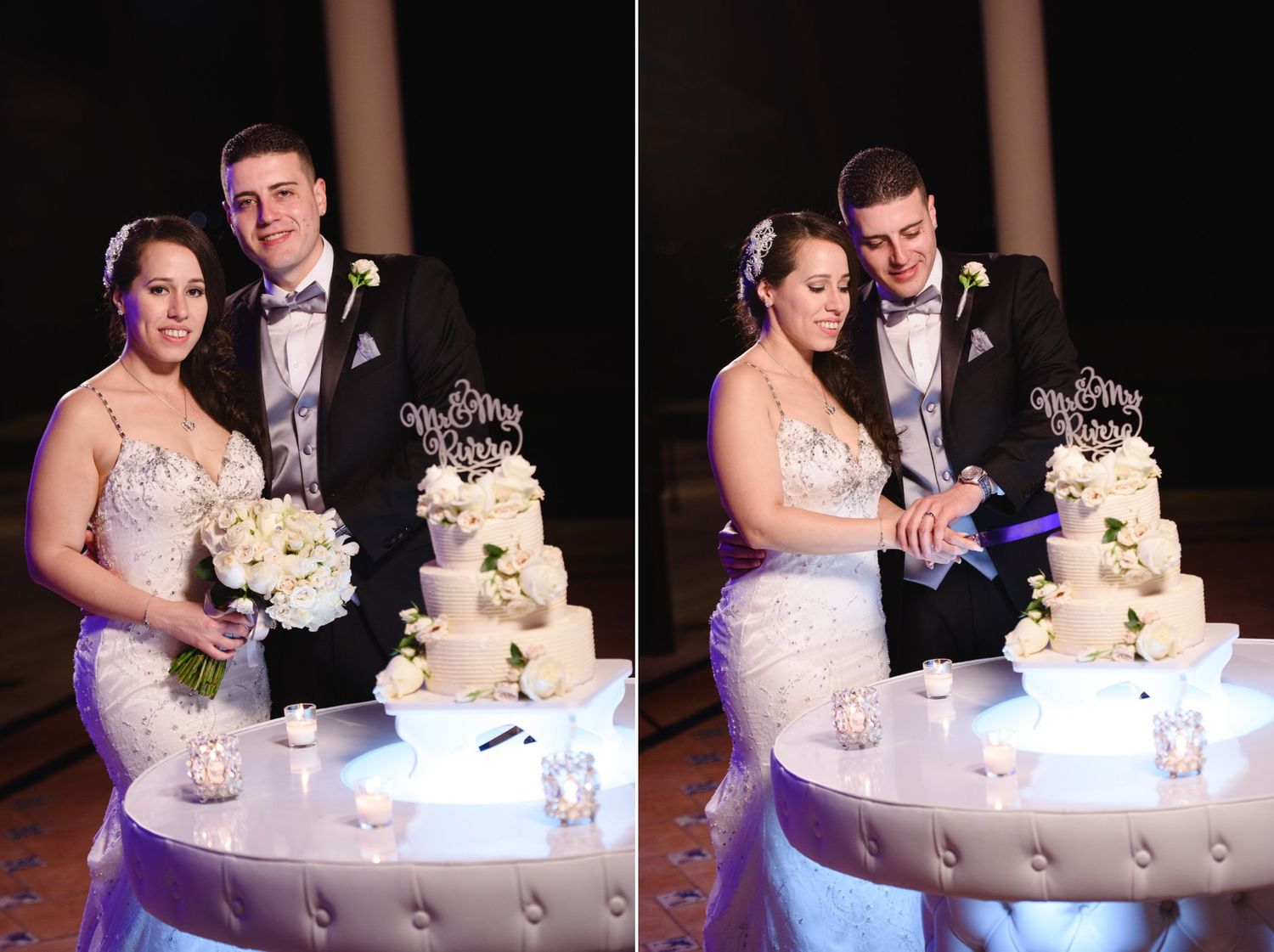 Bride and groom cut their elegant white tiered wedding cake at their reception venue.