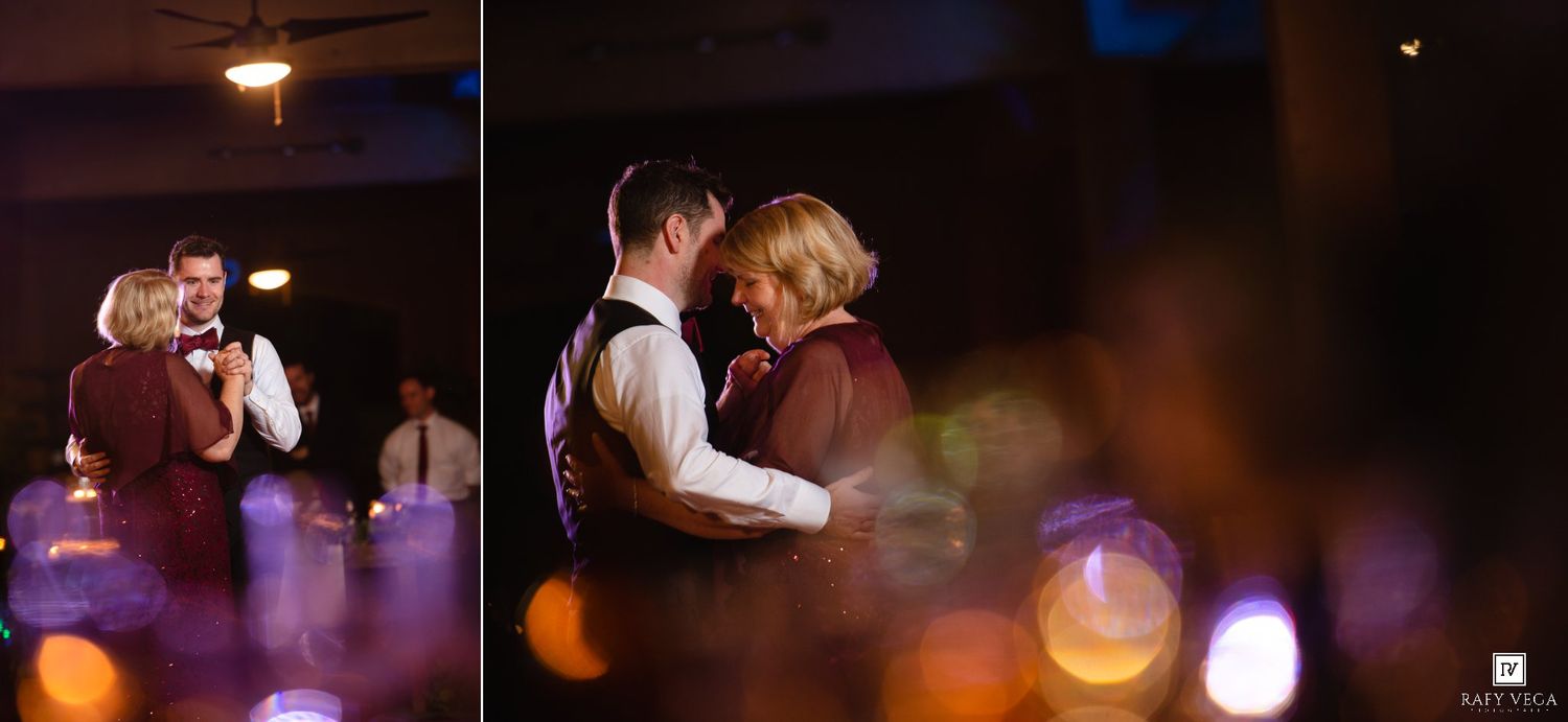 Groom dances with his mother during a heartfelt parent dance at the wedding reception.