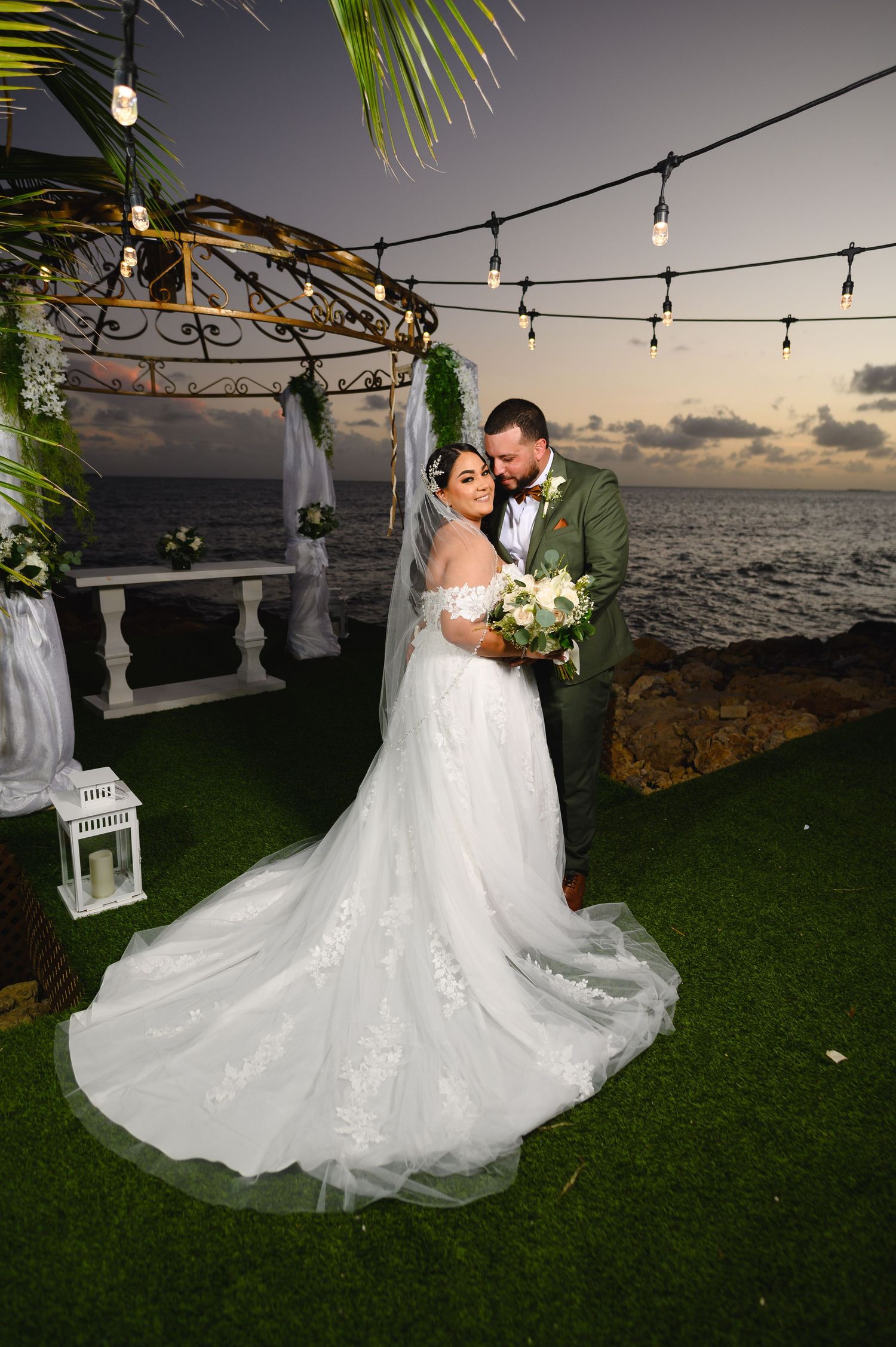 Janaira and Luis during their oceanside wedding ceremony at Ocean View at Porto Caribe in Ponce, Puerto Rico.
