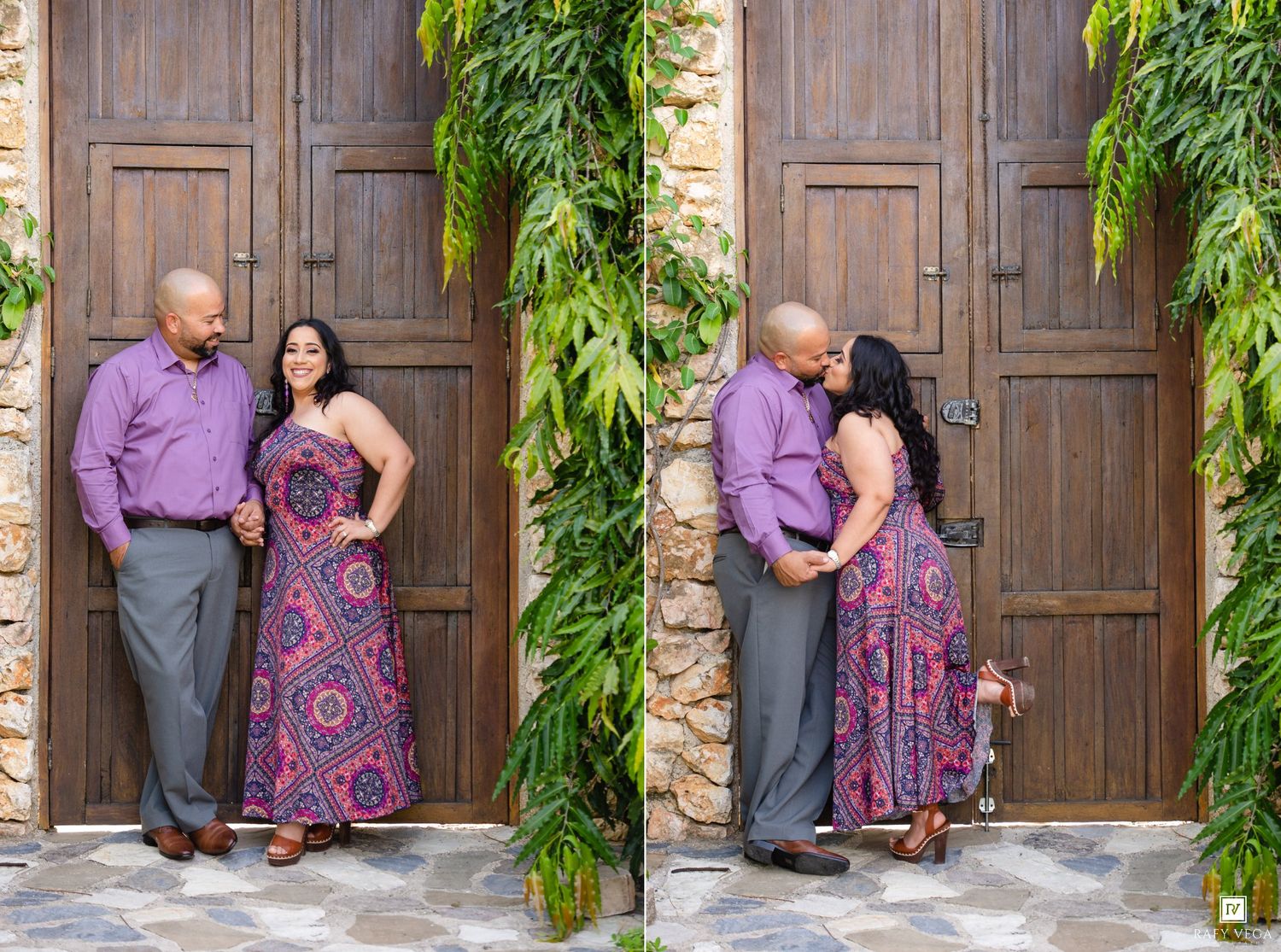 Couple in matching purple outfits posing romantically in front of large wooden doors with green ivy backdrop.