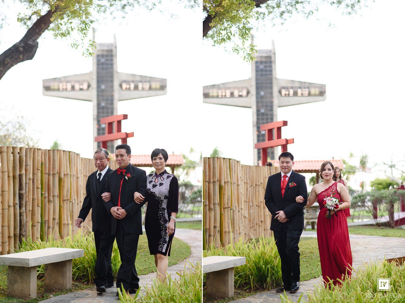 Couple in formal attire walks past decorative airplane monument at outdoor wedding venue.