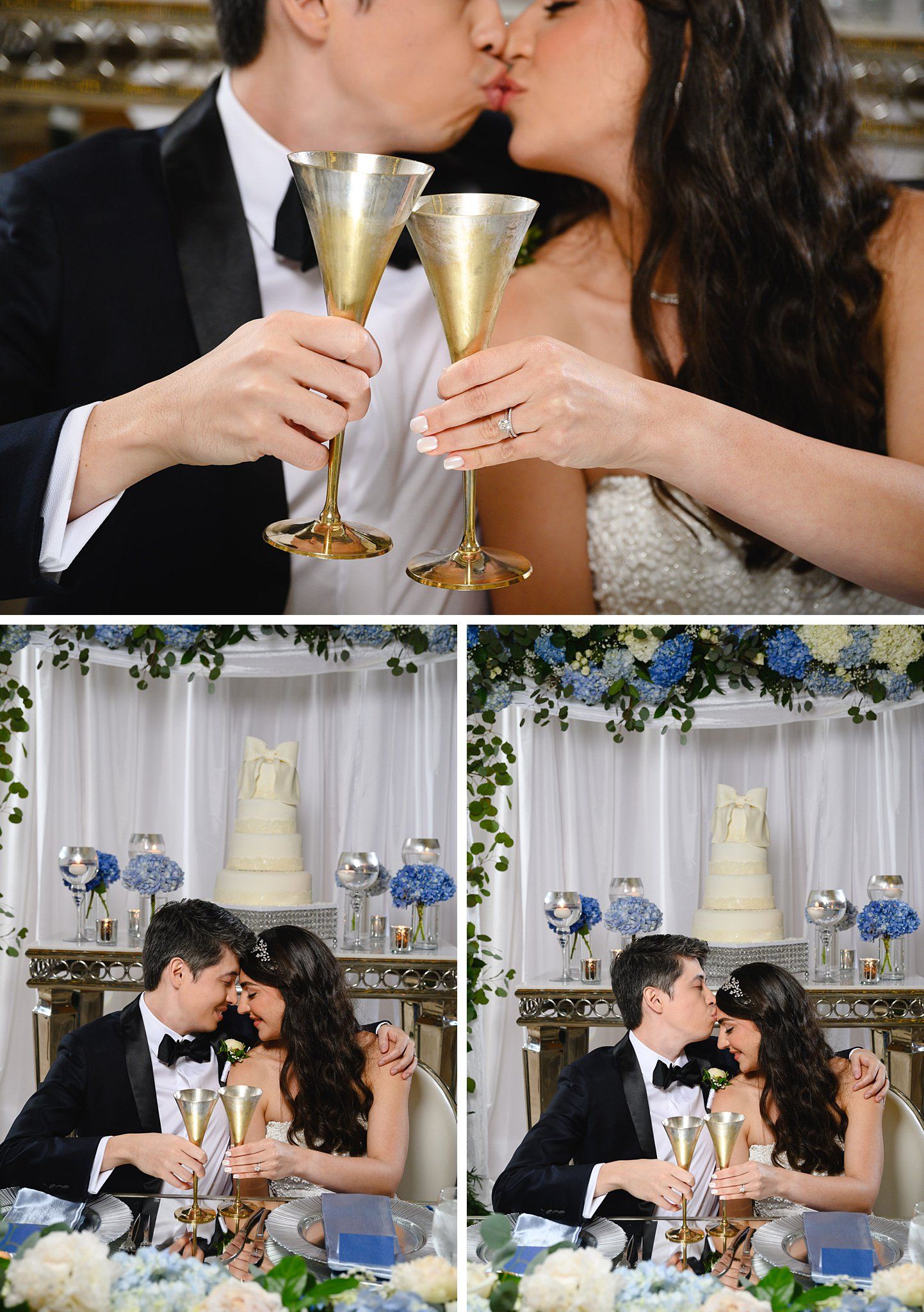 Bride and groom kissing while toasting with gold champagne flutes at elegant wedding reception with white cake.