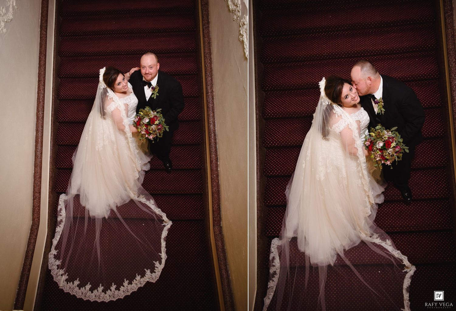 Bride and groom share a romantic moment on grand staircase, her lace cathedral veil cascading down the steps.